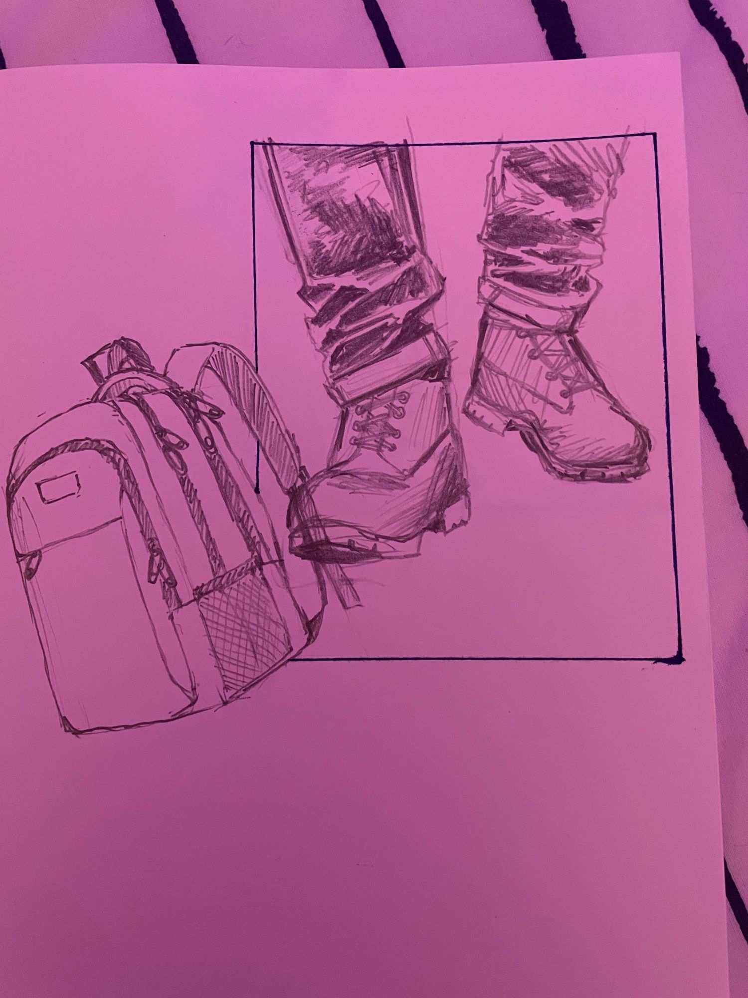 Pencil sketch of a bag, pair of boots.