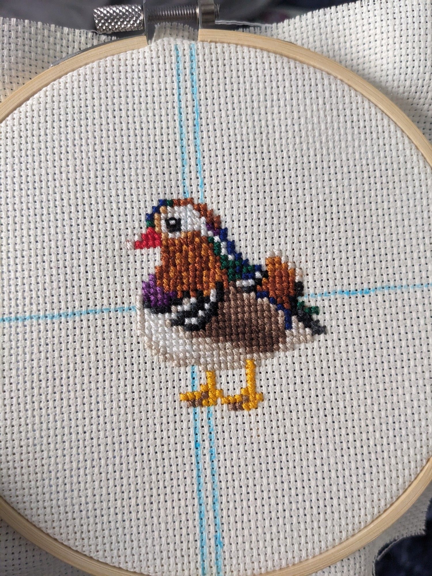 Cross stitched mandarin duck, right side of the work