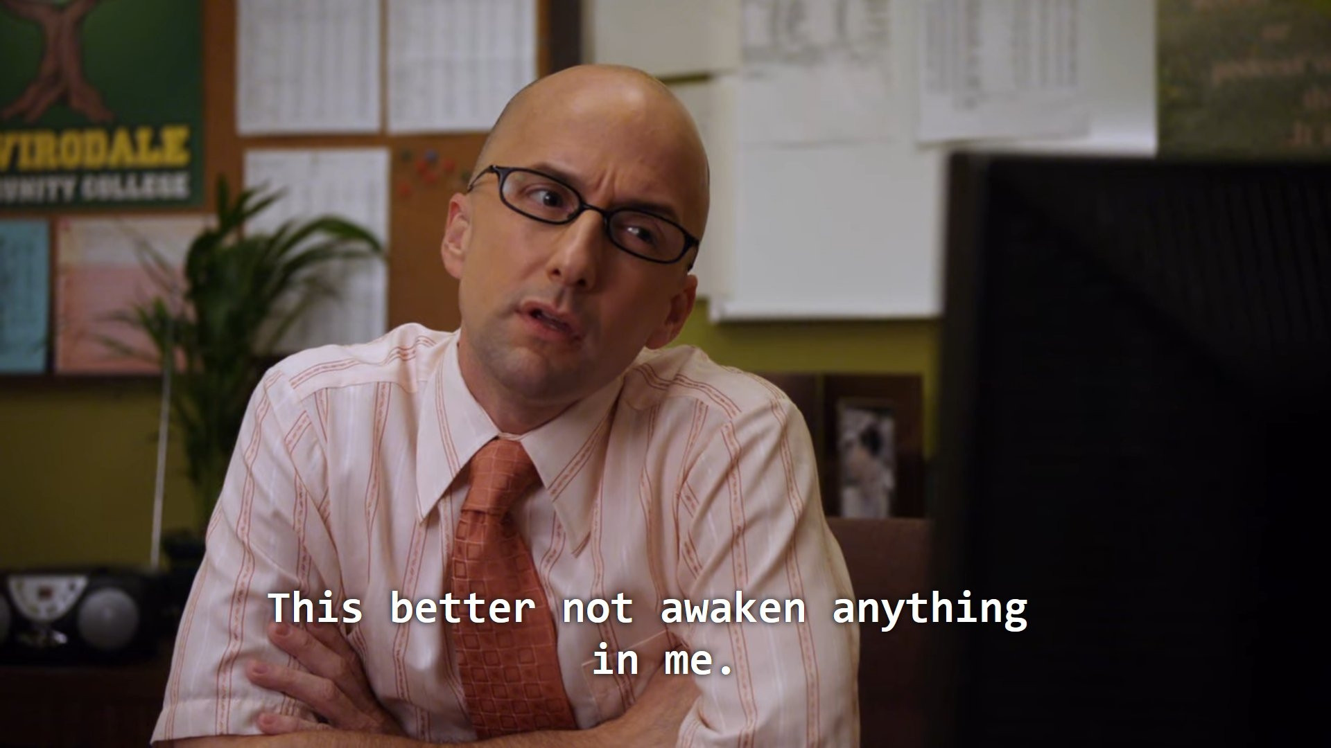 Screenshot from the TV show Community of the dean looking at something not in frame saying "this better not awaken anything in me"