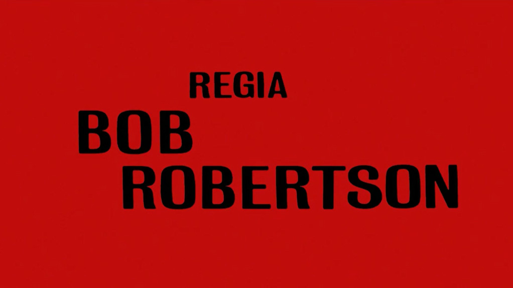 La imagen muestra sobre un fondo rojo la siguiente expresión: "Regia, Bob Robertson."