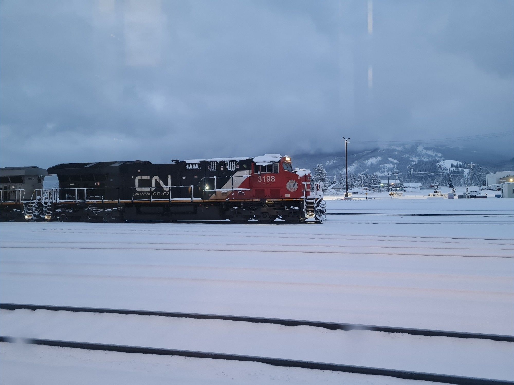 A photo of a CN locomotive in a snow landscape near Jasper