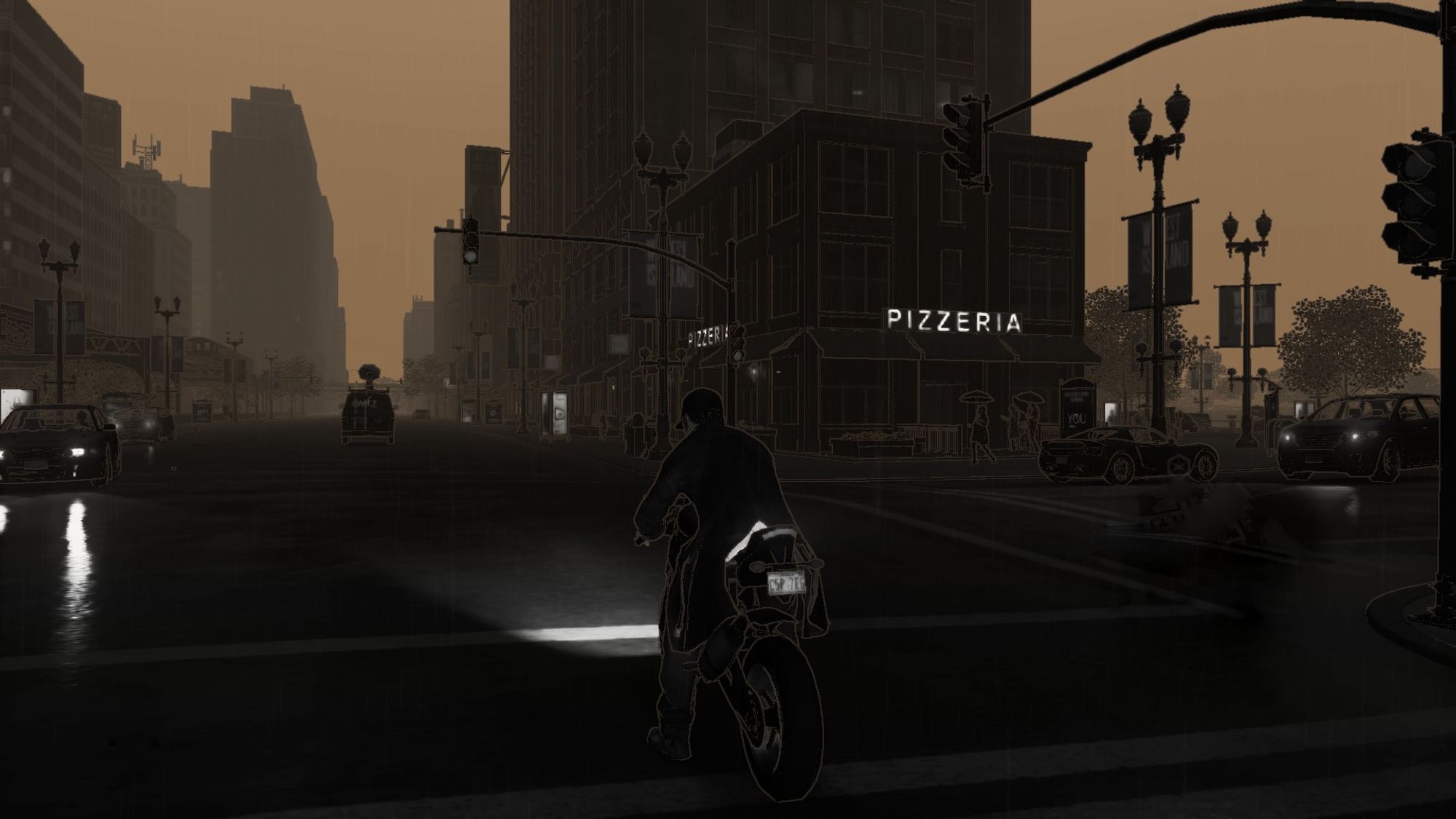 A dimly lit city street scene features a motorcyclist riding in the foreground at an intersection. Cars are stopped at traffic lights. A building with a "Pizzeria" sign is on the corner. The atmosphere is dark and overcast.