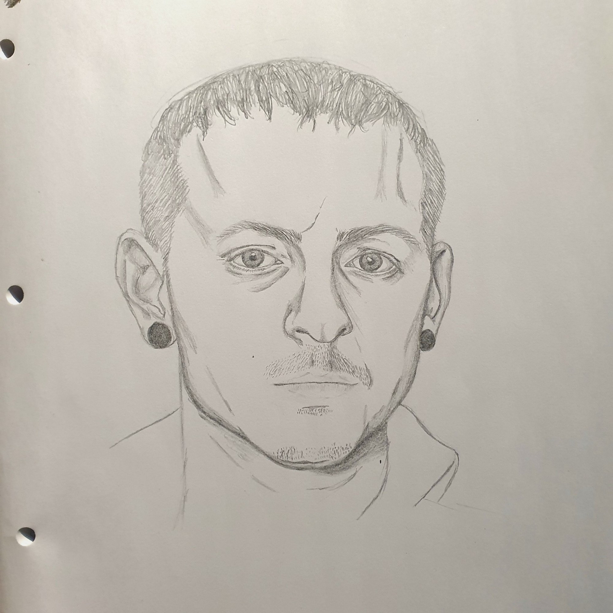 a pencil drawing in a semi-realism style of chester bennington's face