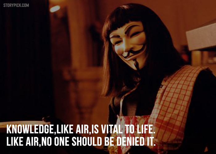 A still from V for Vendetta -- V is in his Guy Fawkes mask, in the kitchen wearing a floral apron with a red and white tea towel flung over his shoulder. The following words are superimposed on the image: Knowledge, like air, is vial to life. Like air, no one should be denied it.