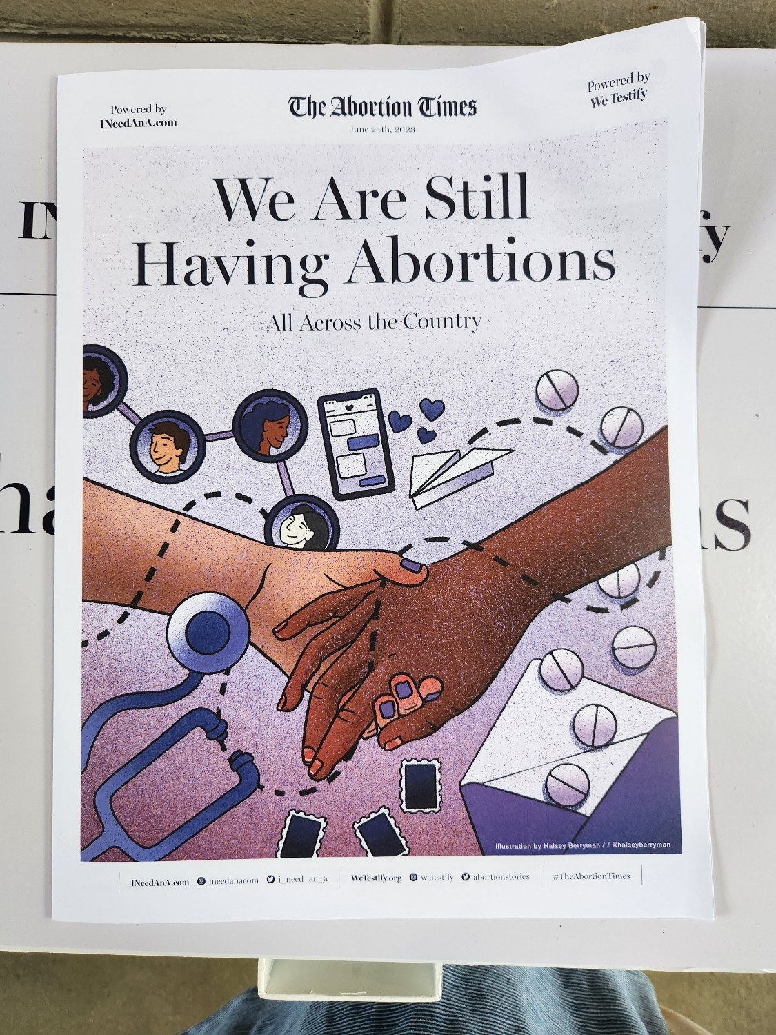 A newspaper that reads "We Are Still Having Abortions"