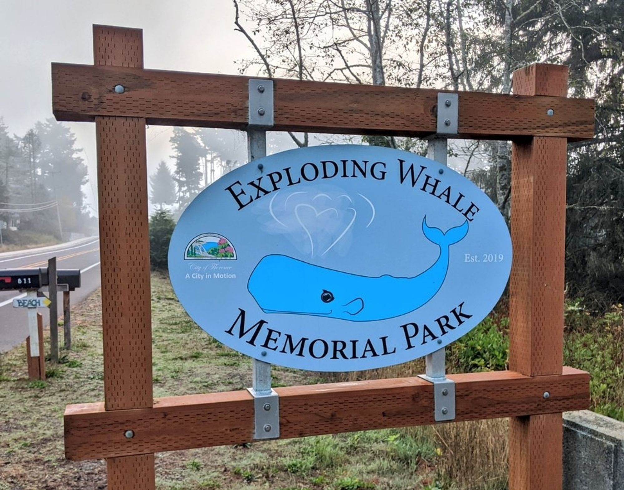 Sign for Exploding Whale Memorial Park, where a whale just exploded one day I guess