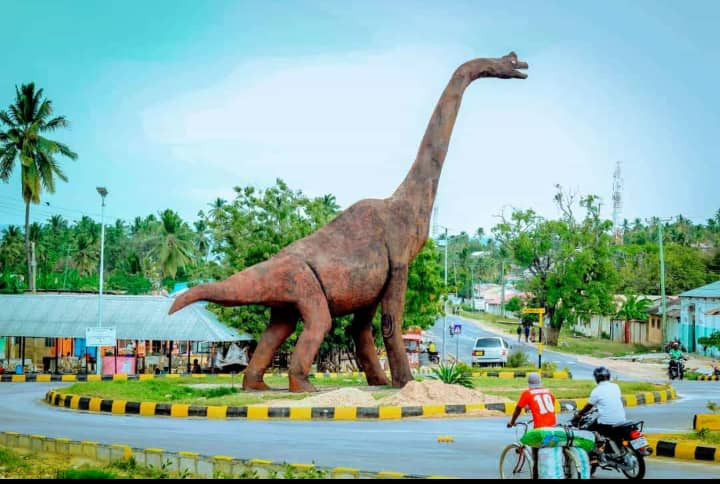 A life-sized sculpture of Giraffatitan (a large Sauropod dinosaur) in the middle of a roundabout in Lindi in Tanzania