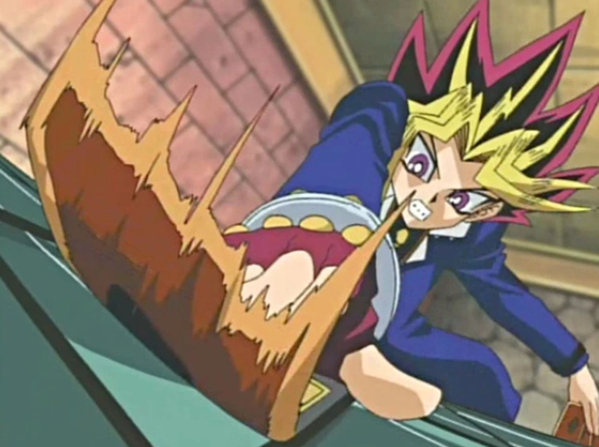 Yugi from Yu-gi-oh slamming a card down