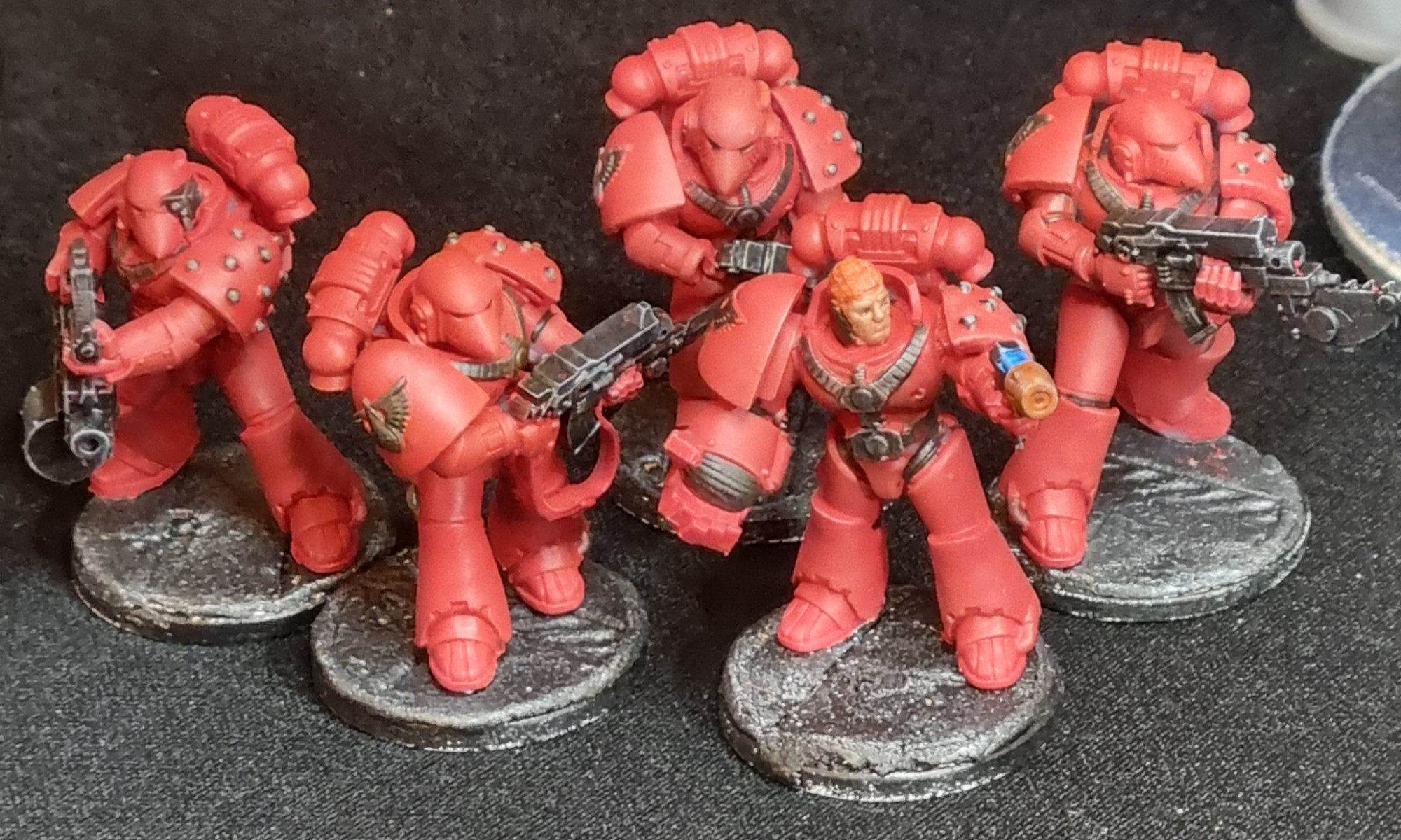 Blood Angels Space Marines in iconic/nostalgic Mark 6 "Beakie" armour.