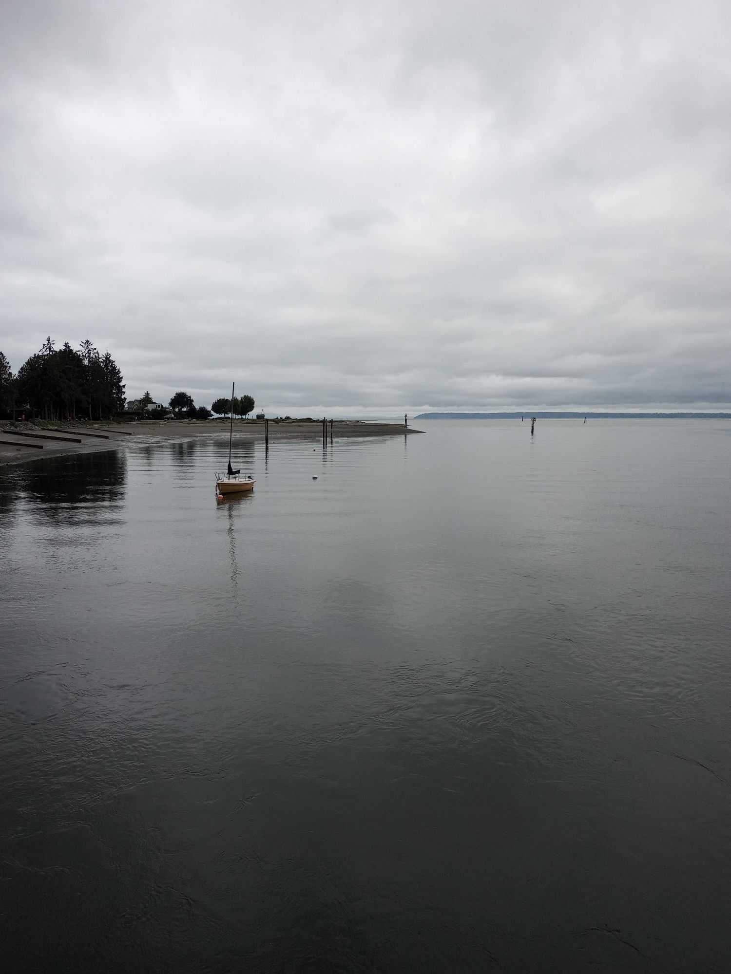 A sailboat moored in a bay