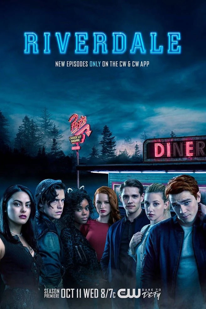 Riverdale cast stand in front of a diner 