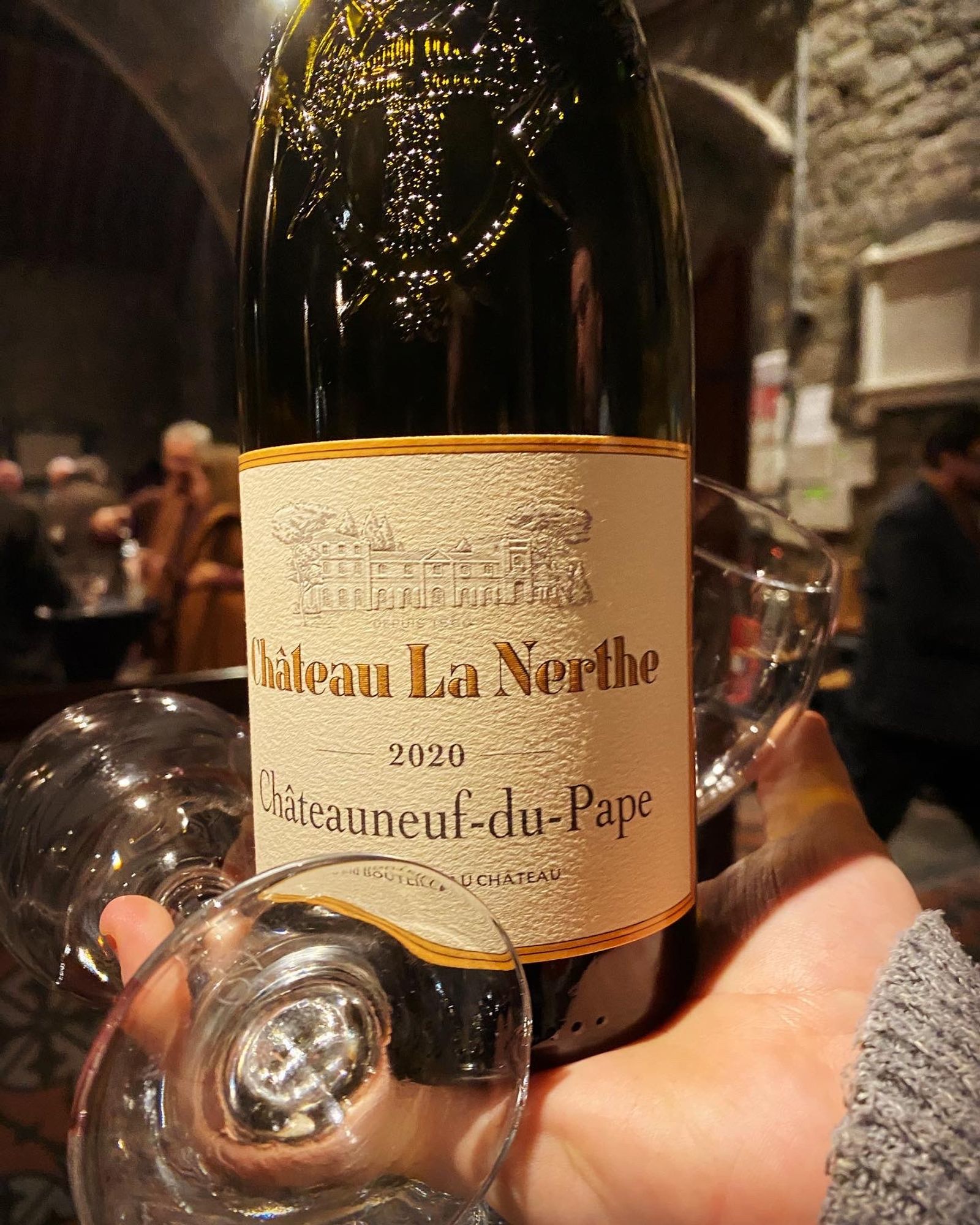 Bottle of Château La Nerthe, a red wine from Southern Rhône, specifically the Châteauneuf du Pape AOC.