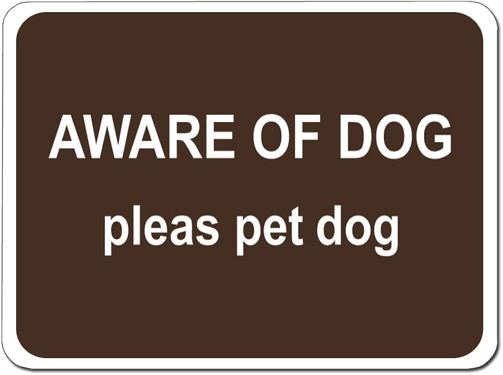 Sign reading, "AWARE OF DOG

pleas pet dog"