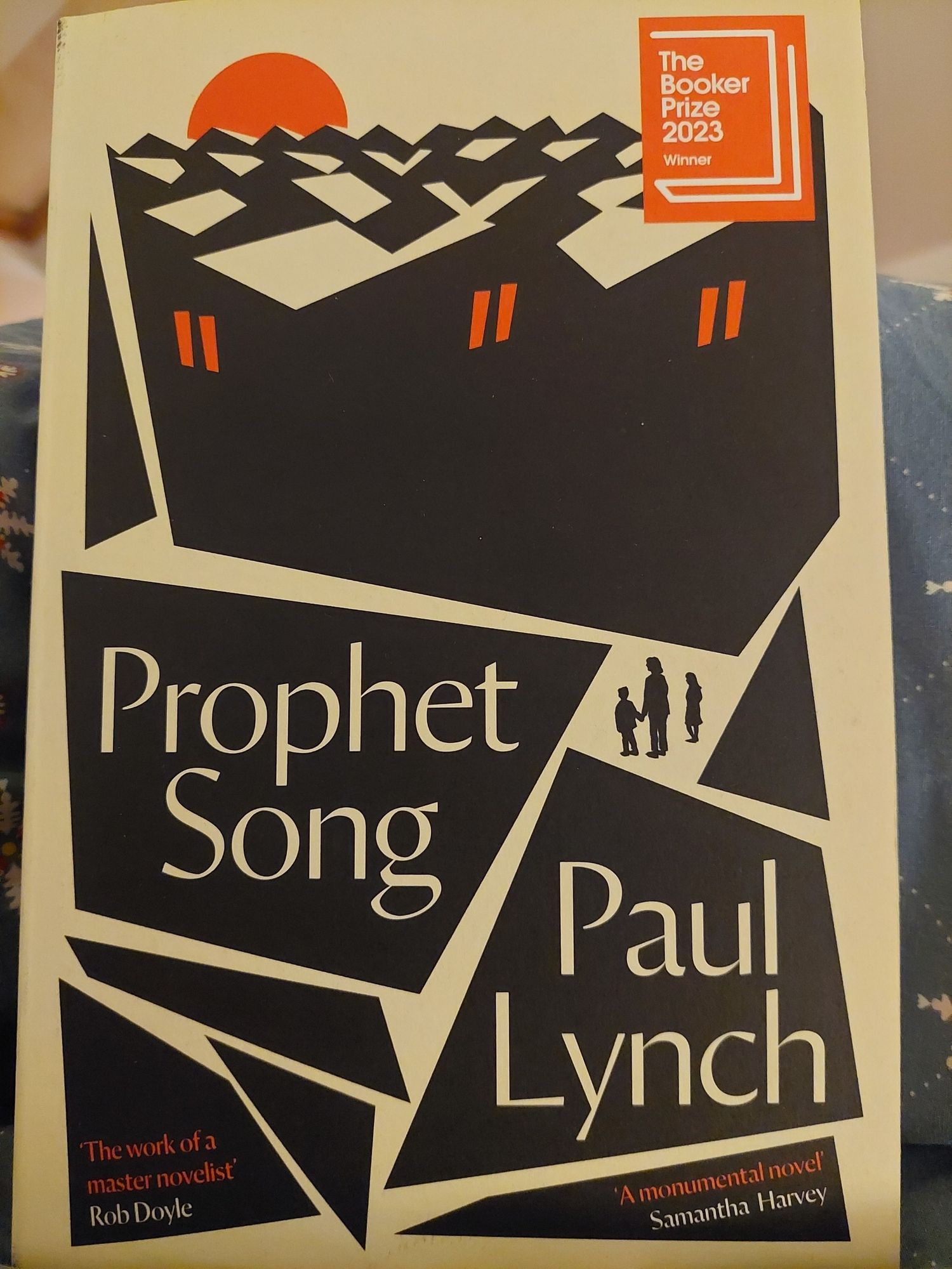 The front cover of Paul Lynch's book Prophet Song - Black, ivory and red