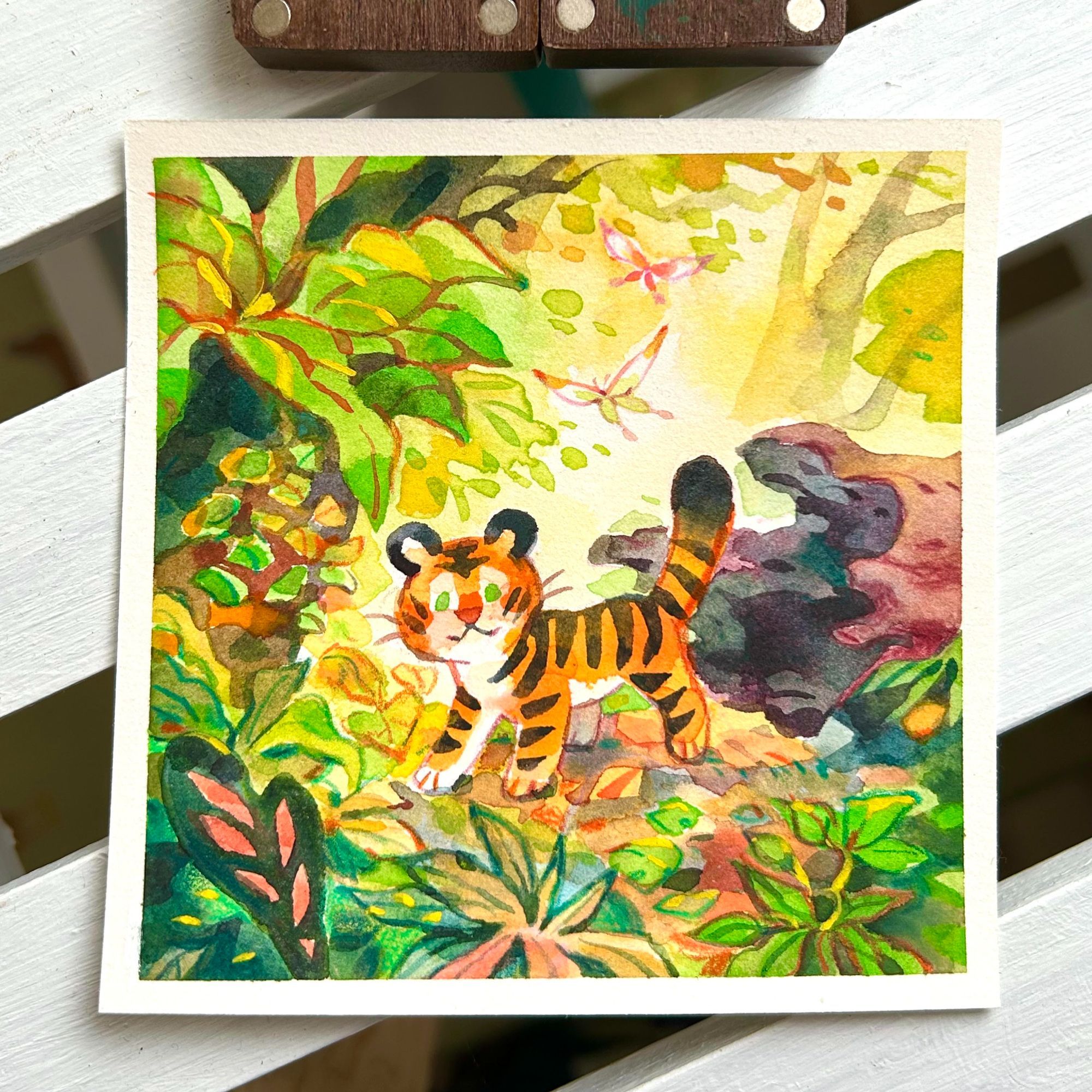 watercolour illustration of a tiger in the rainforest