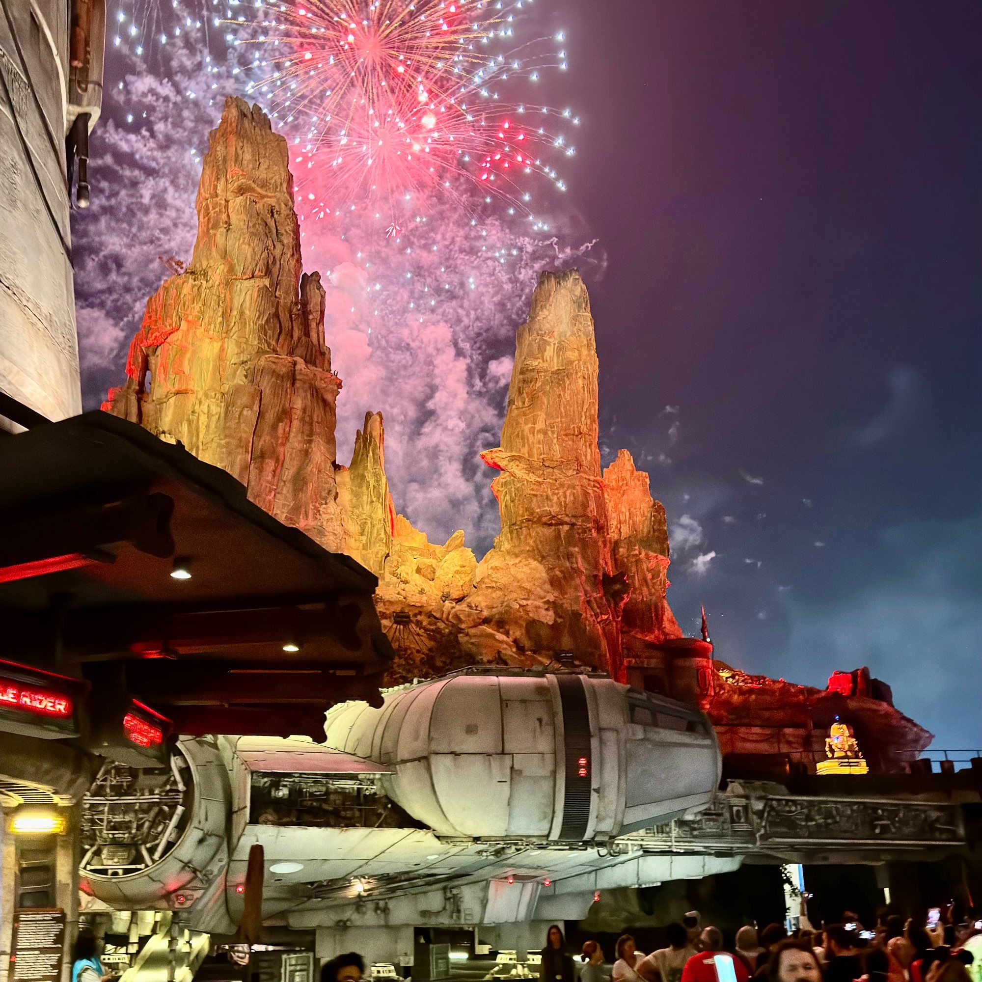 Fireworks over the millennium falcon at disneyland galaxy edge