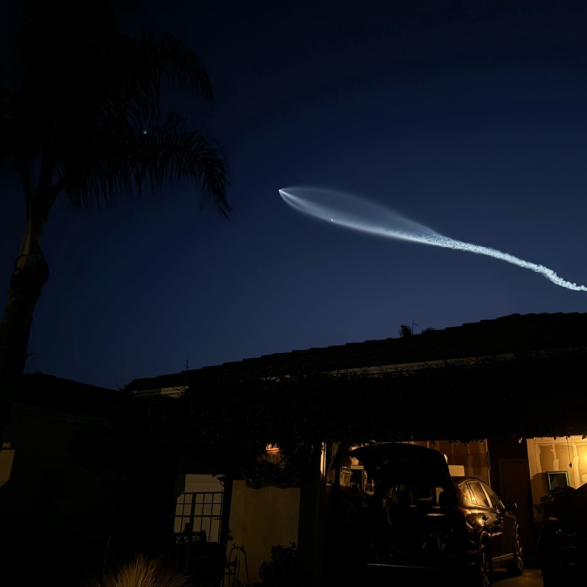 Spacex launch in the sky. Rocket has a long trail of white