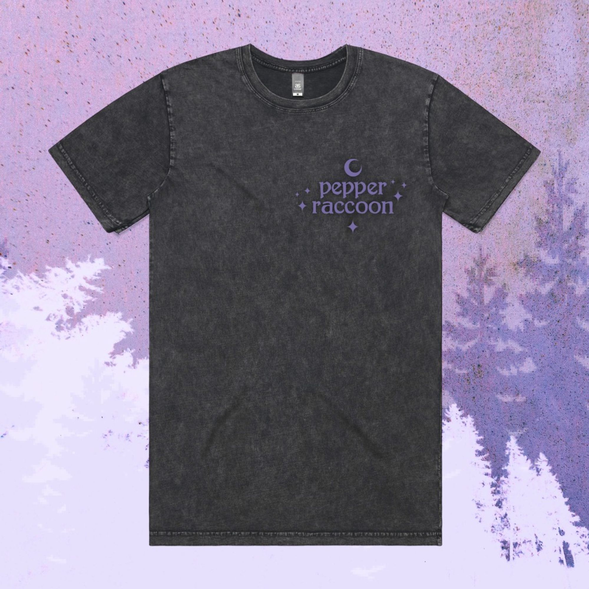 The front of the shirt features cosmic details and a small Pepper Raccoon logo.