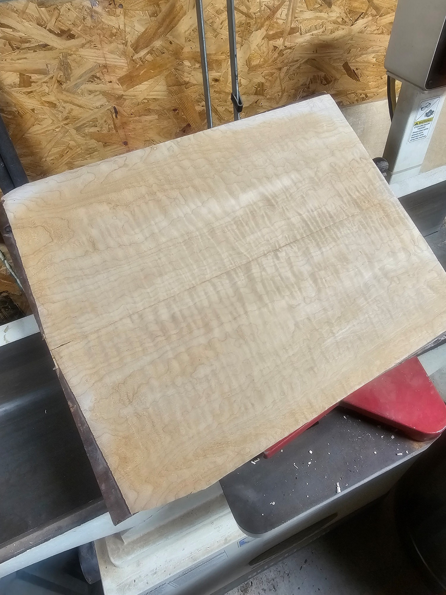 Flamed maple guitar blank, basically a big block of wood, 15 inches wide, 21 inches long, and 2 inches thick.