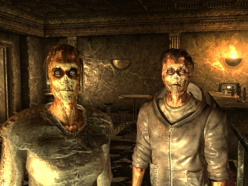 Screencap from Fallout 3. Two ghouls with melted, irradiated faces staring straight ahead