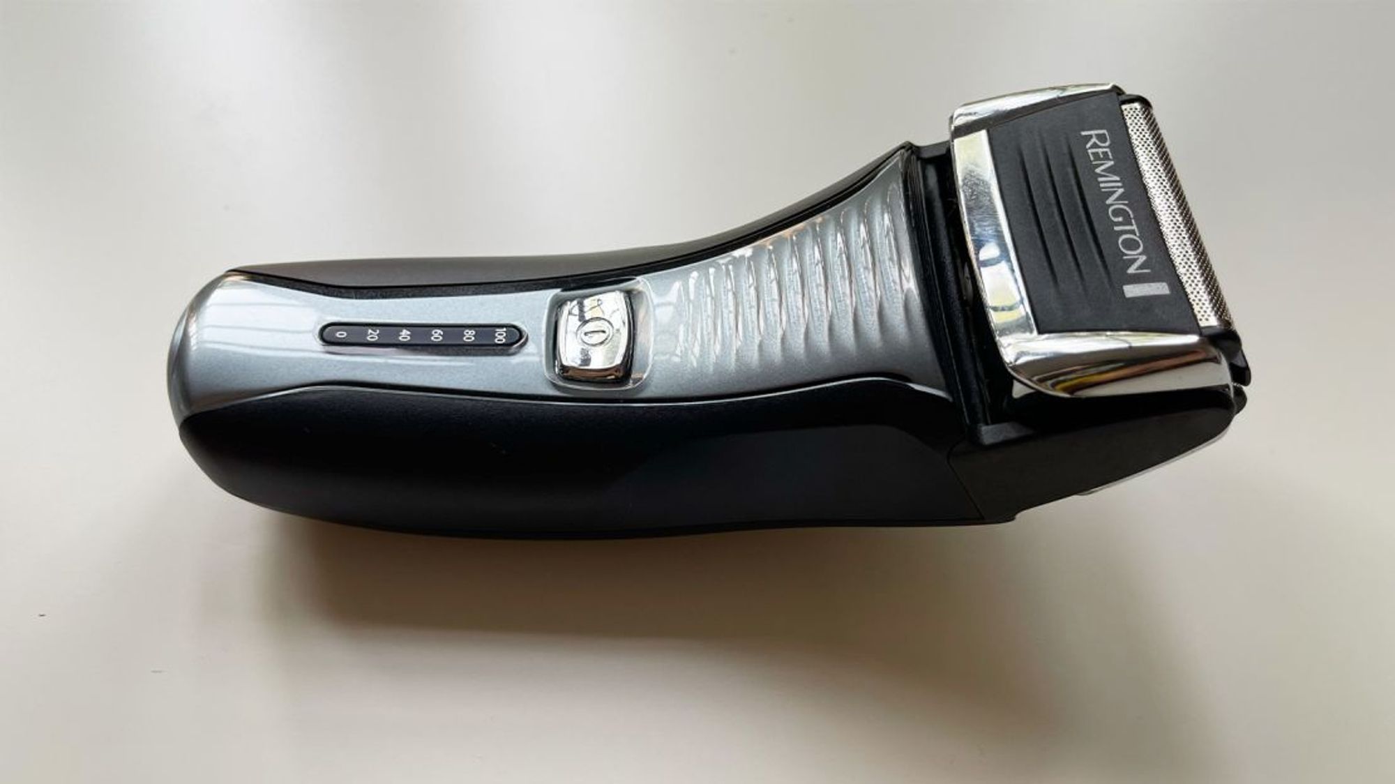 An electric razor - sleek, yet formless.