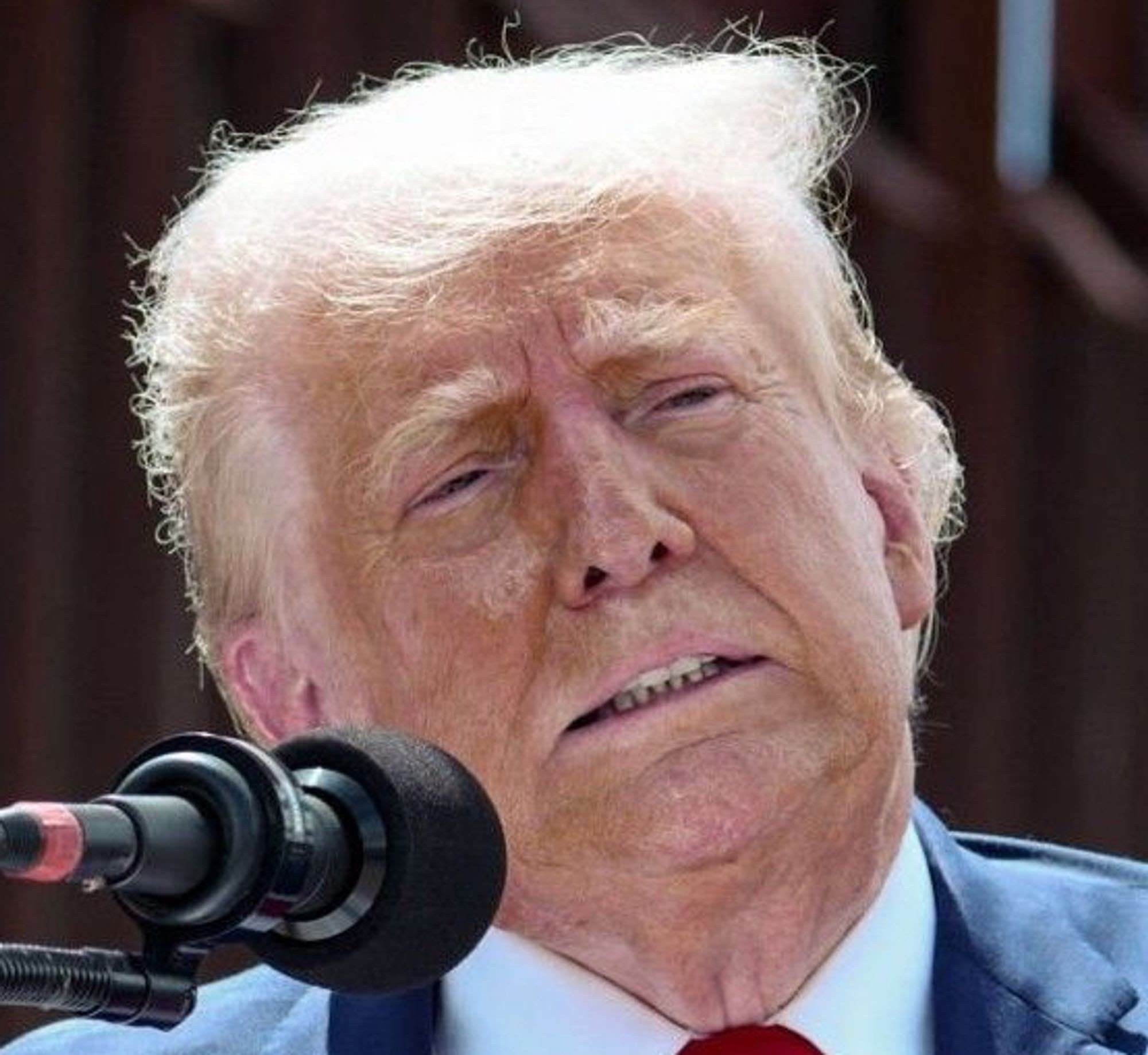 Donald Trump looking miserable and really really bad. Like T-Virus infection bad. Like a Stretch Armstrong that got left in the Texas sun for all summer. No seriously, this is not a joke, he looks like he's got one foot in the grave and one foot on a banana peel.