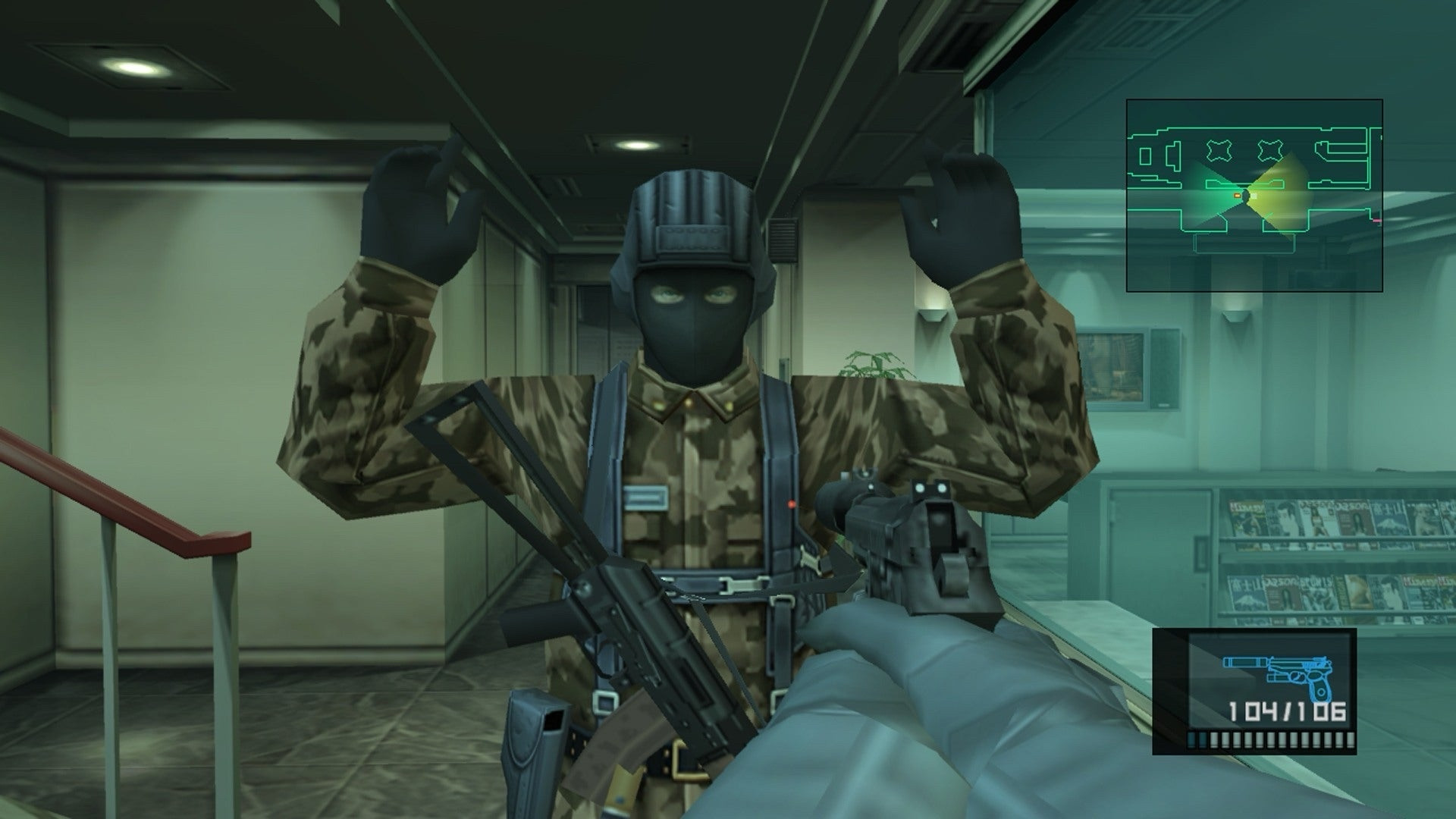 Snake pointing gun at a soldier with his hands up from the game Metal Gear Solid 2