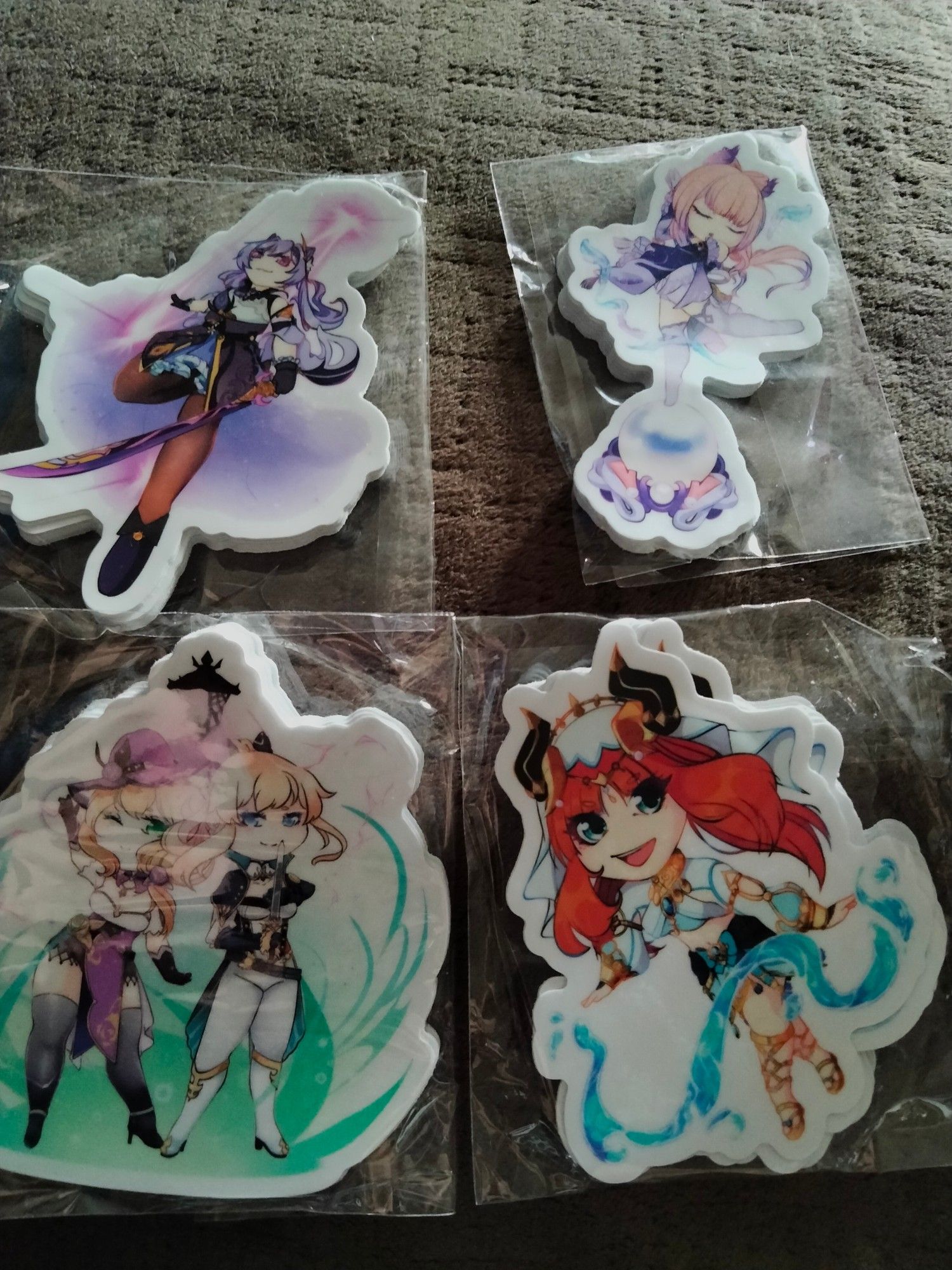 3in, die cut stickers featuring female character from Genshin Impact such as Nilou, Jean, Lisa, Kokomi and Keqing.