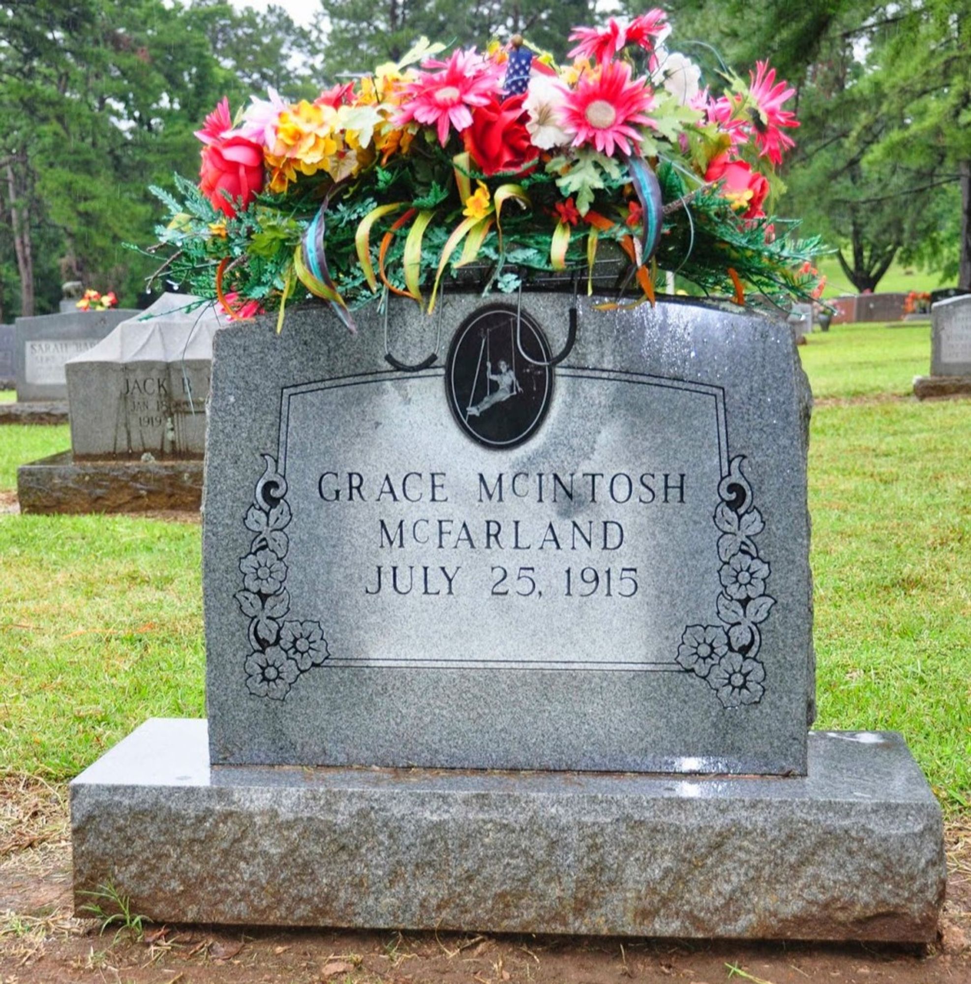 The marker of Grace McIntosh McFarland, a trapeze artist.