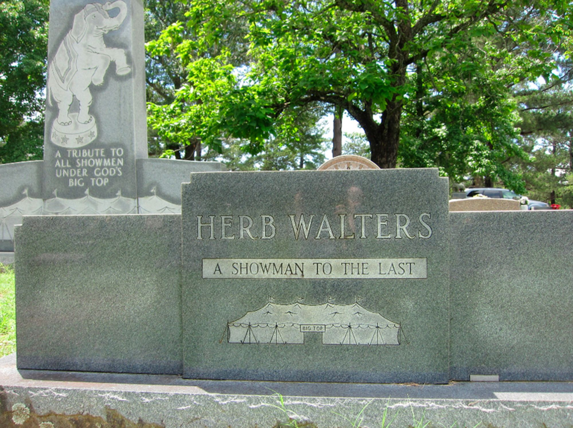 The tomb of Herb Walters, featuring a circus tent and the words A SHOWMAN TO THE LAST.