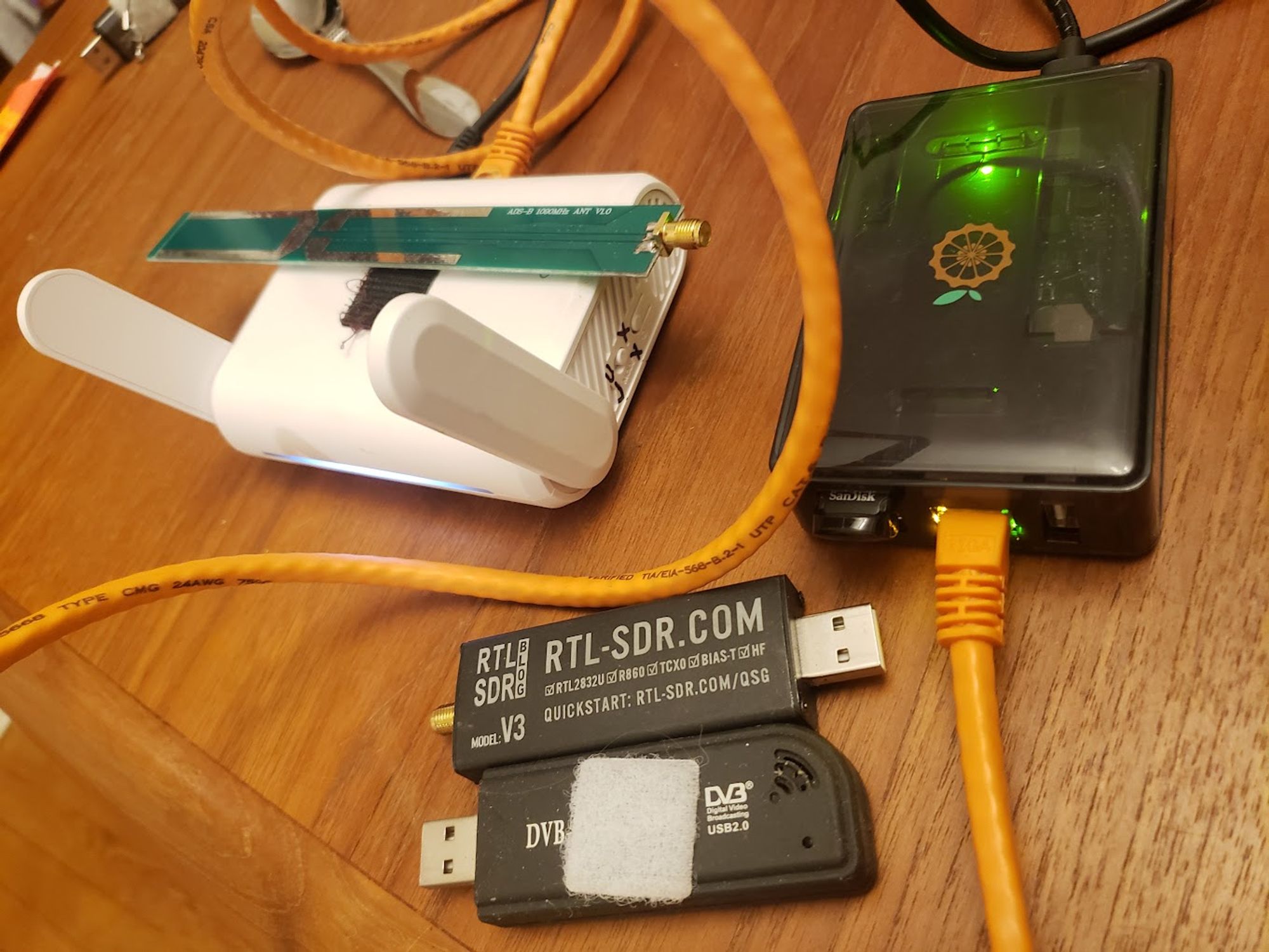 photo of orange pi, glinet router, sdr's