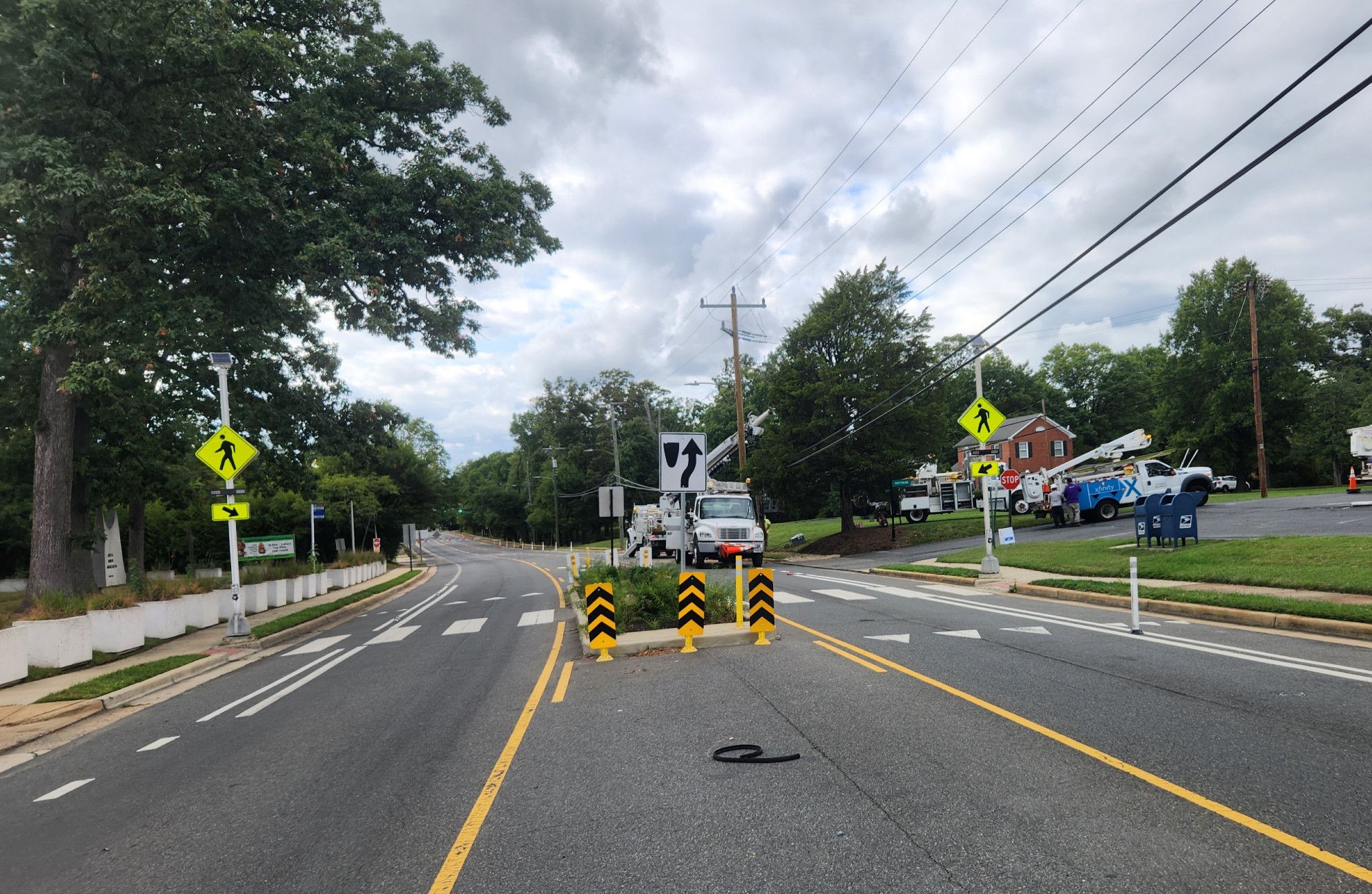 Pedestrian refuge island and bike lane infrastructure on Seminary Road appear intact following a crash to the west of this location on Sunday, 09/22