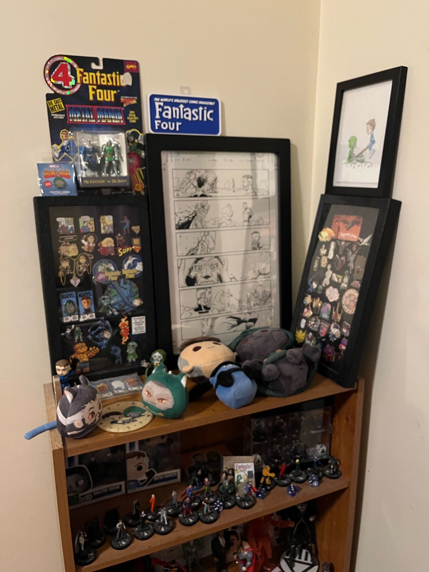 doomreed displays, one framed original comic art of 2-in-one annual, plushies, pin box displays, dc comics ships at the lower shelves