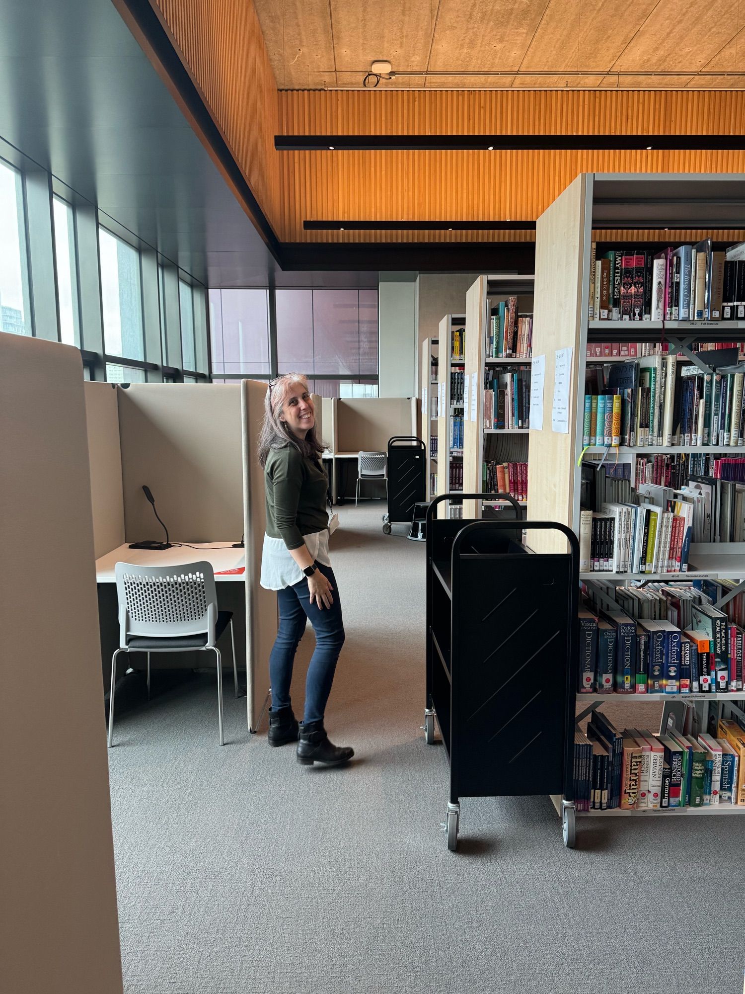 A librarian amongst the bookshelves at University of the Arts, London