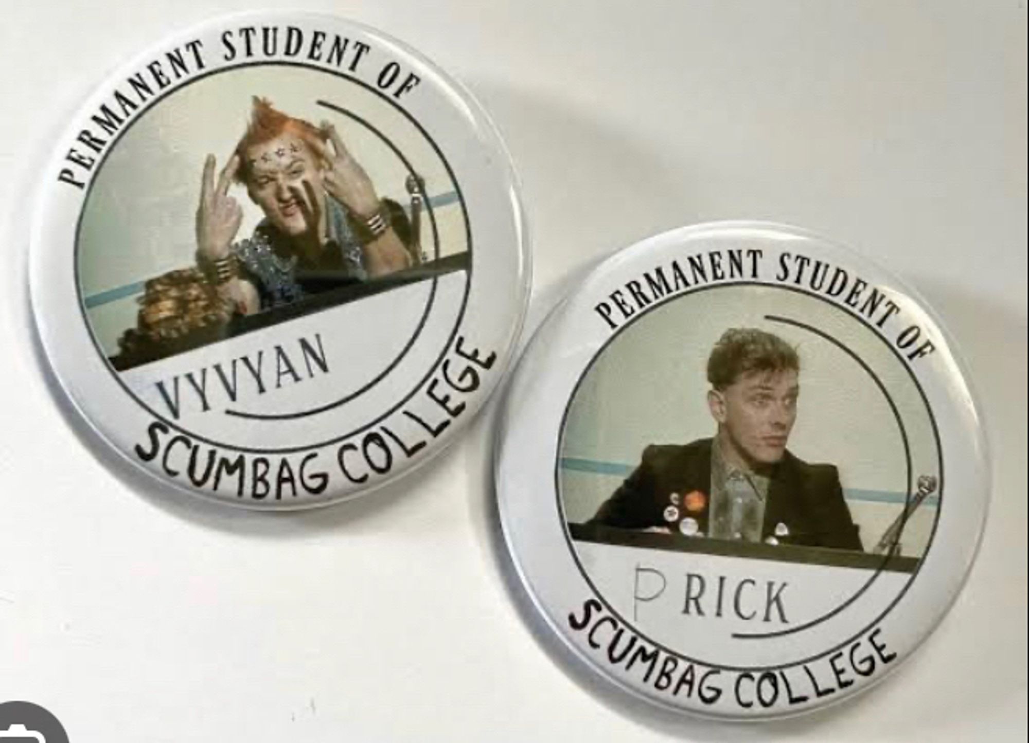 Two badges are depicted from the episode ‘Bambi’ from ‘The Young Ones’ season 2.

Both declare ‘permanent students of Scumbag College’. One is for Vyvyan, the other is for Rik (adjusted to Prick)
