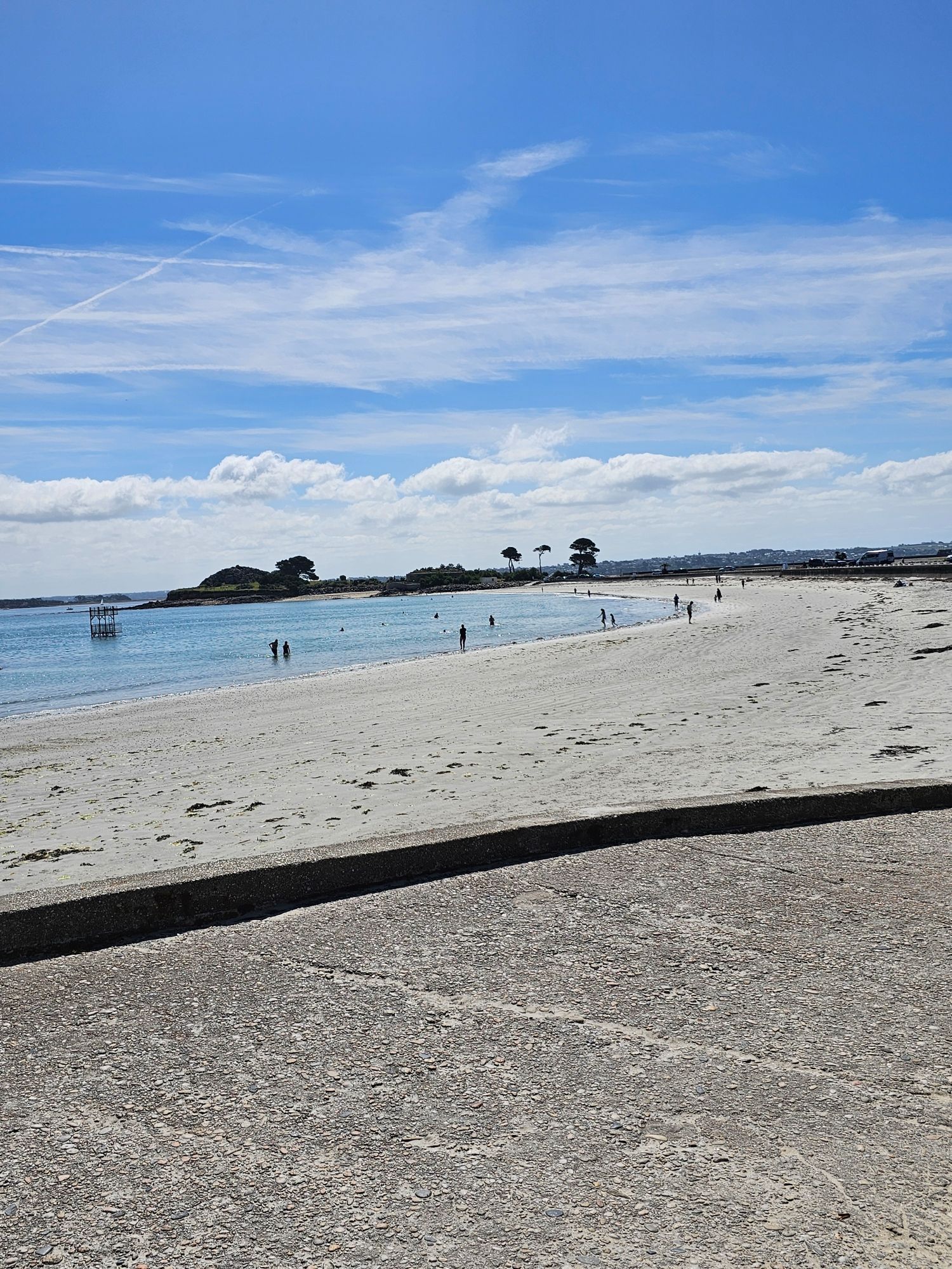 A view of plage st anne bathe in glorious sunshine