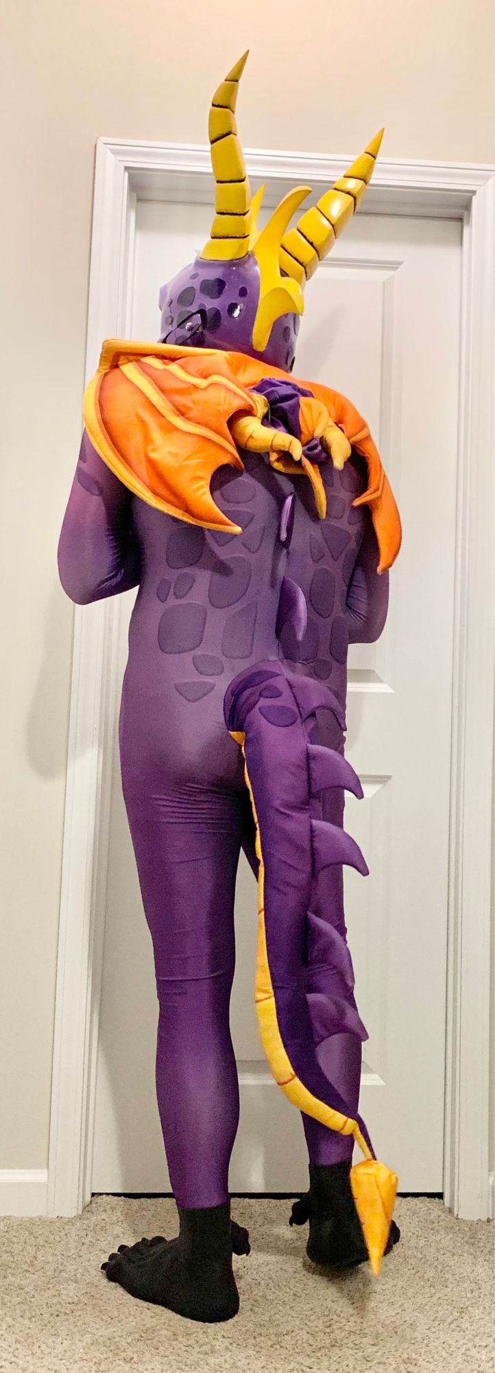 Spyro the Dragon cosplay consisting of a spandex bodysuit and 3D-printed helmet/mask. (Rear View)