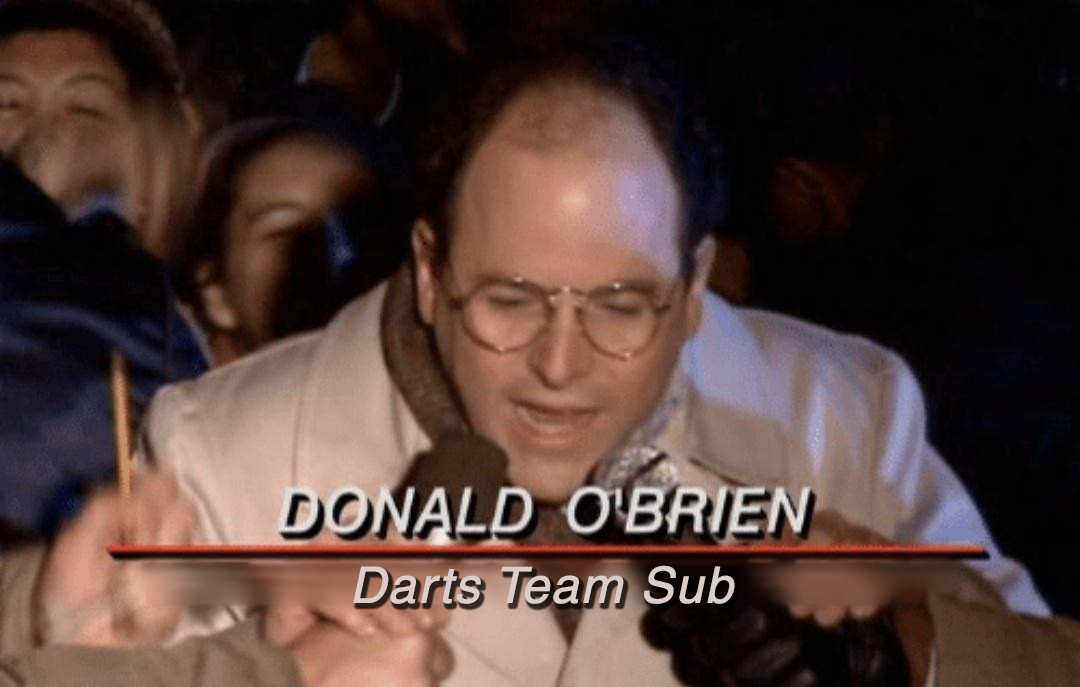 George Costanza - caption: Donald O'Brien, Darts Team Sub