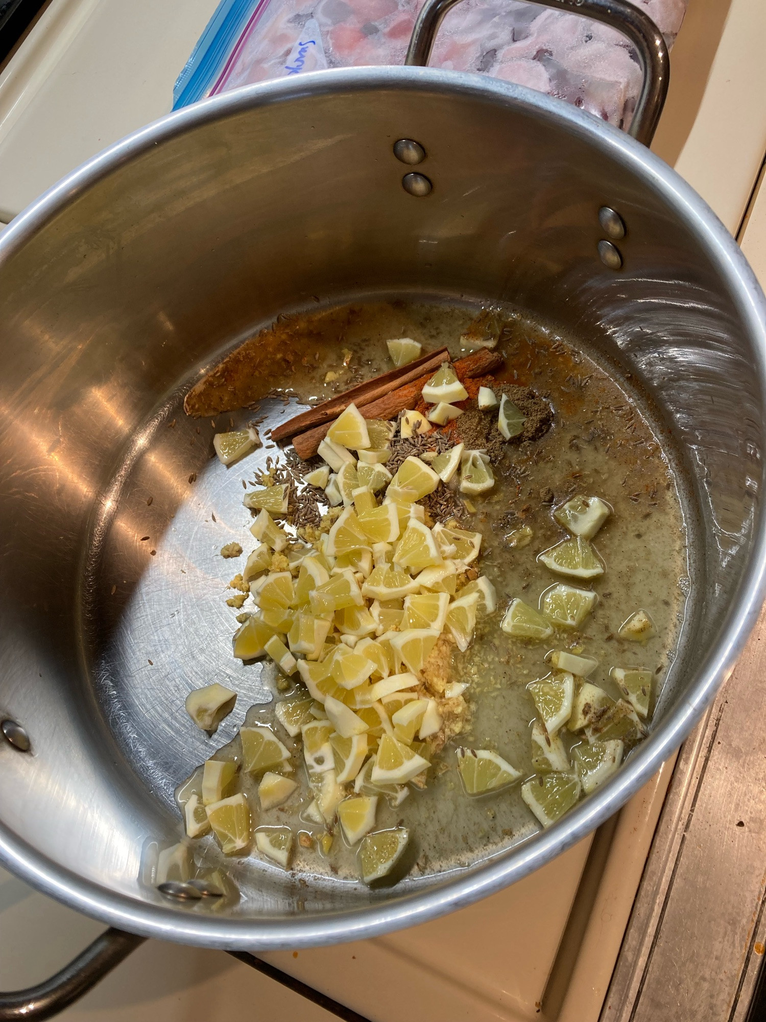 Ginger, lemon and spices in a pot