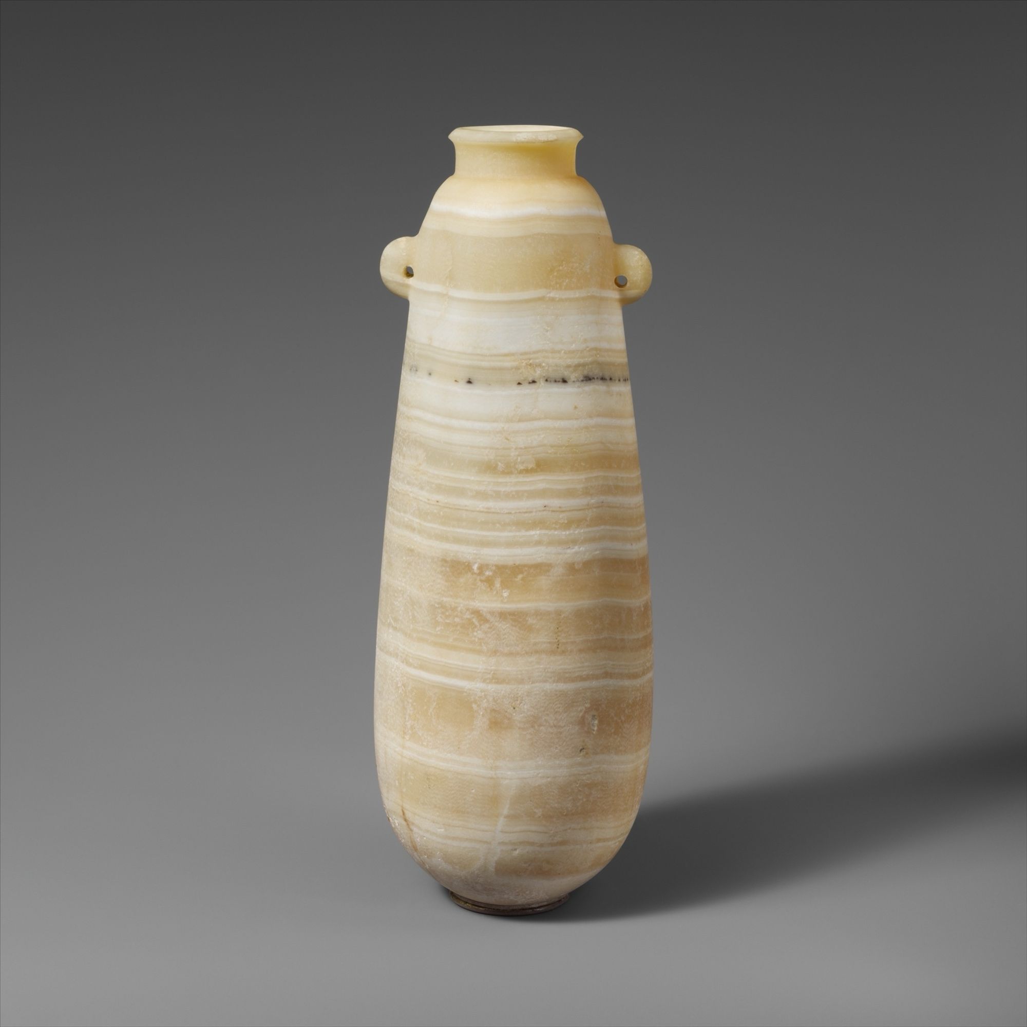 Alabaster alabastron (perfume vase)
Cypriot
6th–5th century BCE


The alabastron is particularly large in size. The two vertical lugs are pierced. The neck is short, with a slightly thickened lip.

Via the Met

https://www.metmuseum.org/art/collection/search/244004