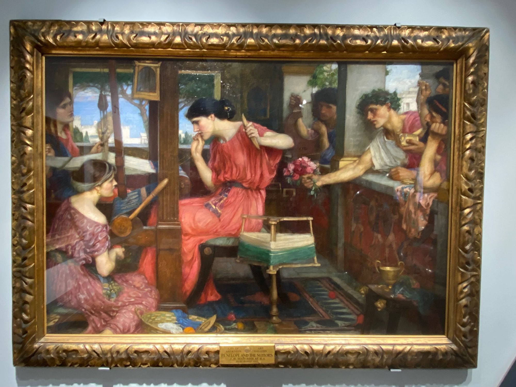 Penelope in the centre is weaving. To the left of her are her doomed maidservants. And to the right of her, her doomed suitors.