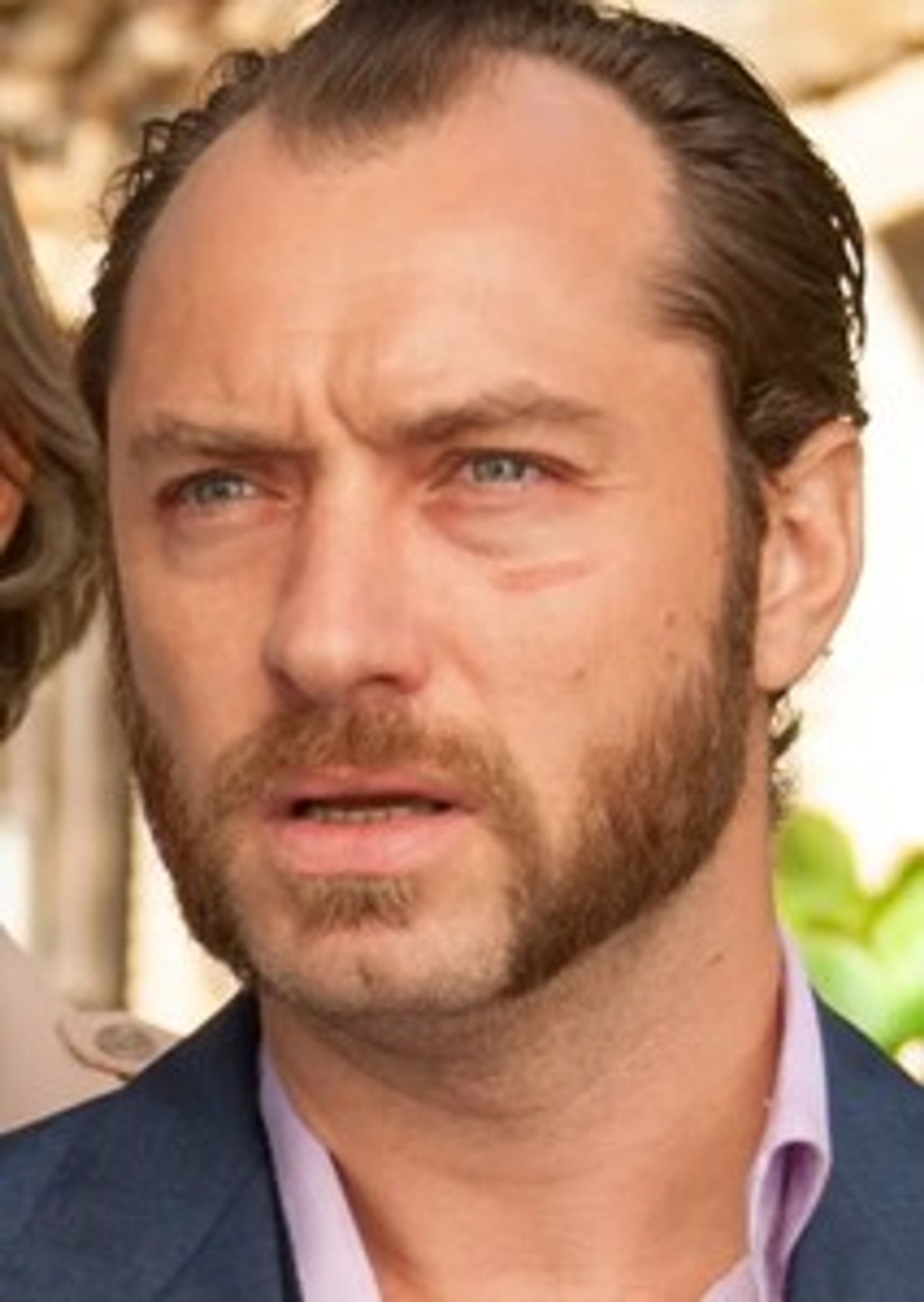 Jude Law with muttonchops from the film Dom Hemingway