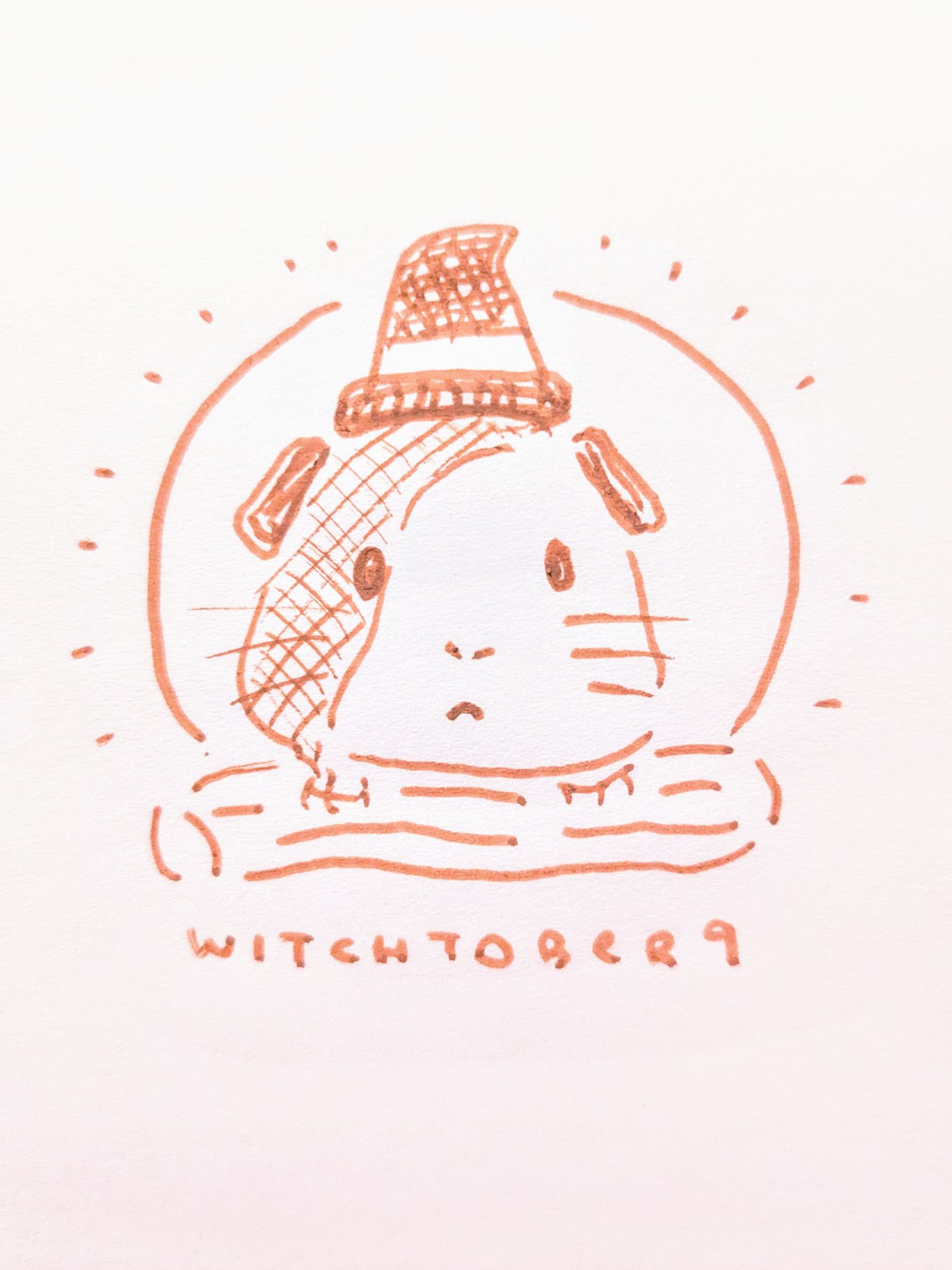 brown marker drawing of guinea pig with front paws on a log and a little witch hat on their head