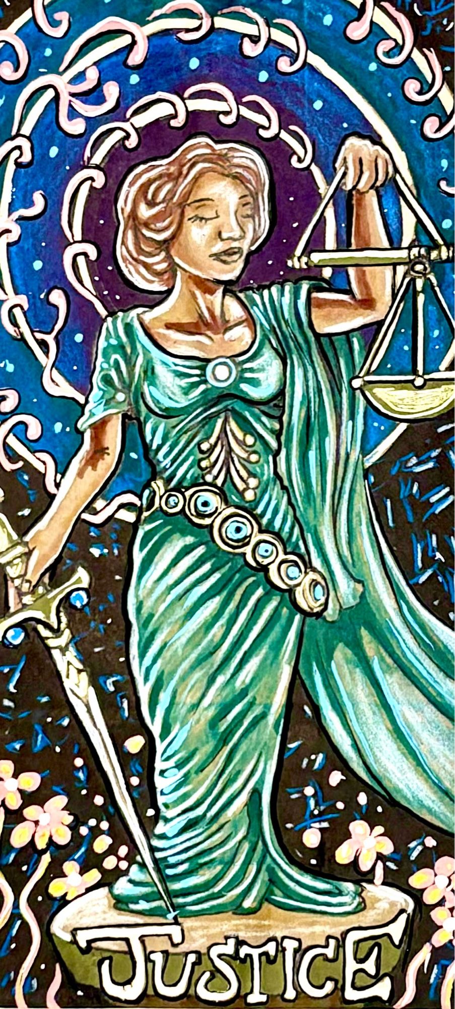 Illustration on a brown paper bag of the Justice tarot card depicting a woman with her eyes closed holding a scale in one hand and a sword in the other