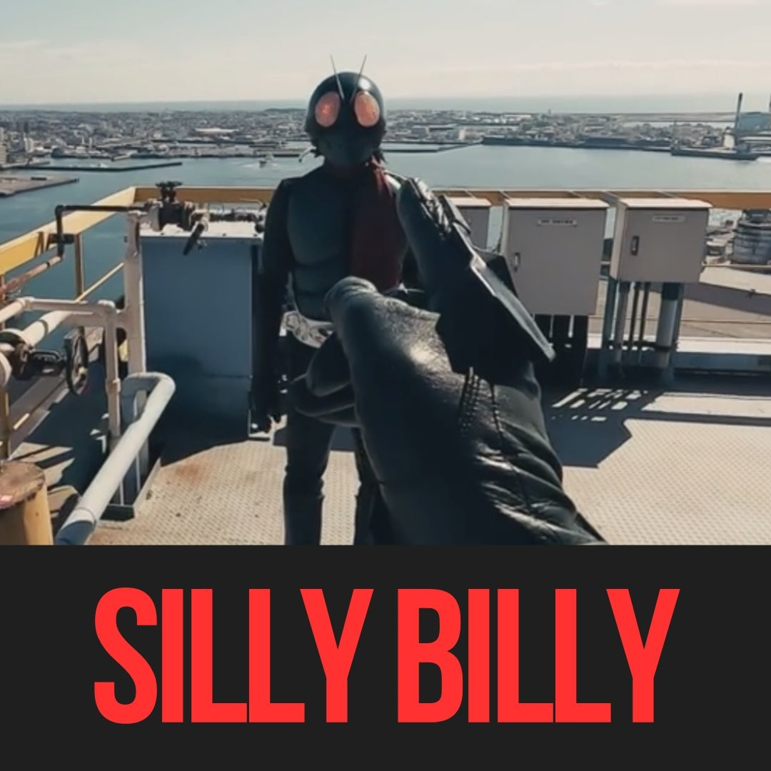 Finger pointed at Kamen Rider from Shin Kamen Rider captioned with "Silly Billy" on the bottom