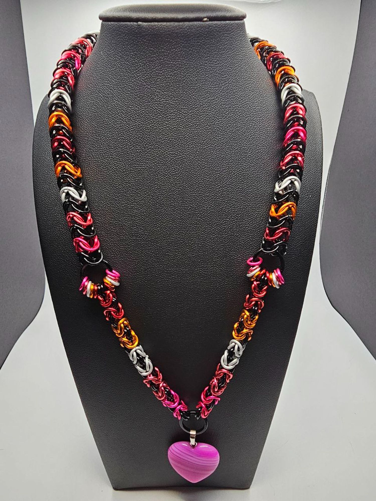 Punk lesbian themed necklace with byzantine and box weave chainmail