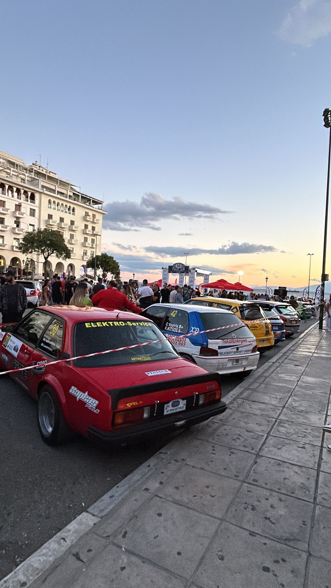 A bunch of rally cars including an Opel Ascona, Peugeot 106, Suzuki Swift and a bunch of Peugeot 206s