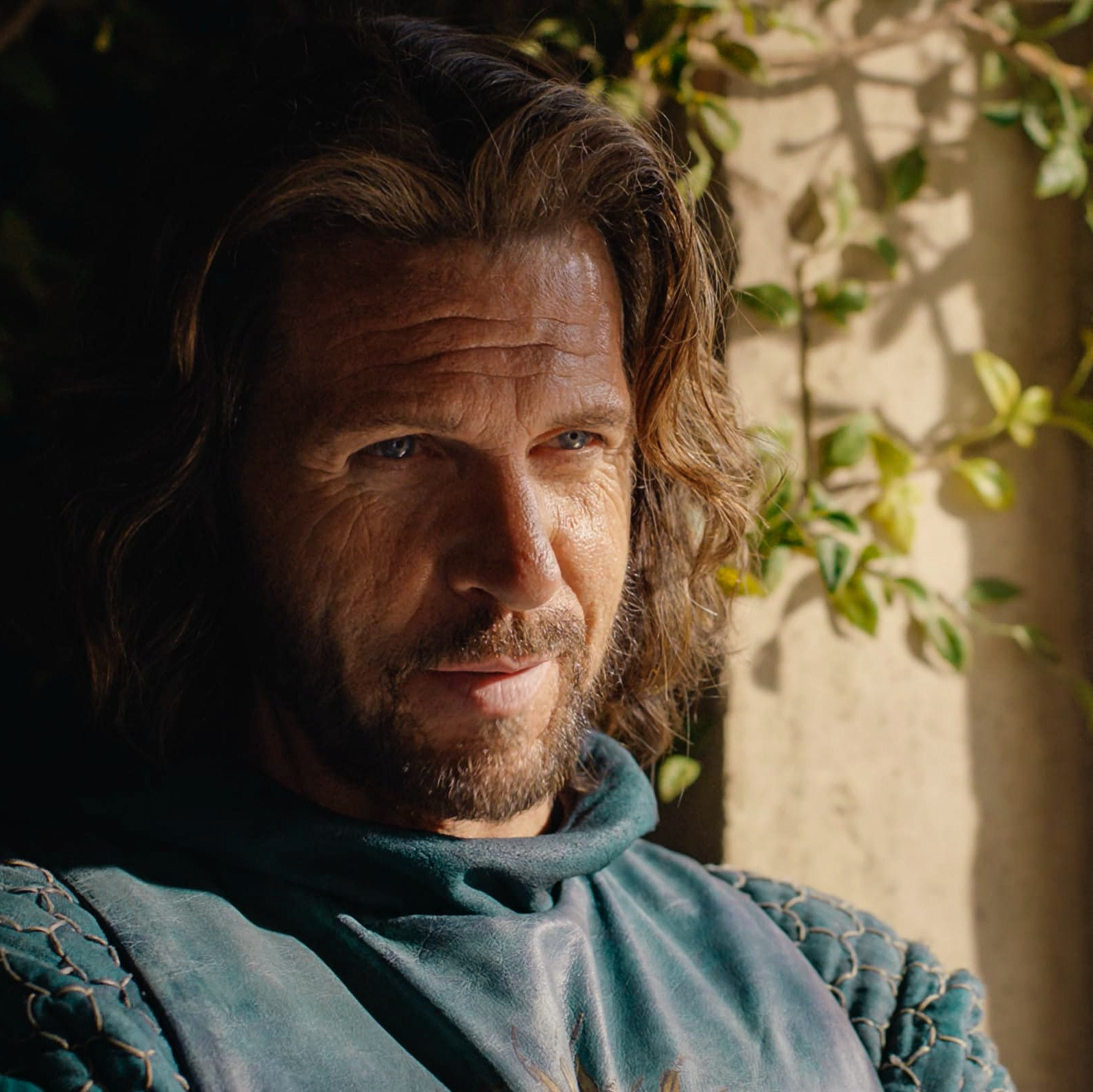 screenshot of lloyd owen as elendil from the rings of power season 1 episode 3, in a scene where he confronts galadriel attempting to escape 