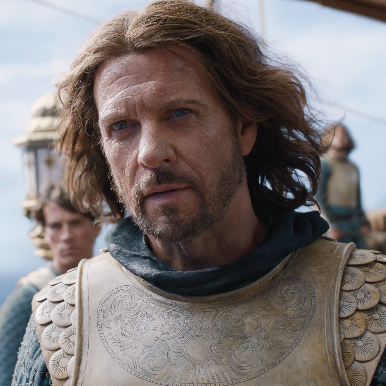 a screenshot of lloyd owen as elendil from episode 1.03 of The Rings of Power.