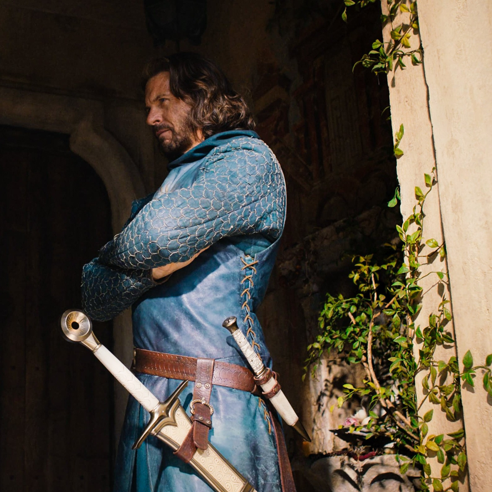 screenshot of lloyd owen as elendil from the rings of power season 1 episode 3, in a scene where he confronts galadriel attempting to escape 